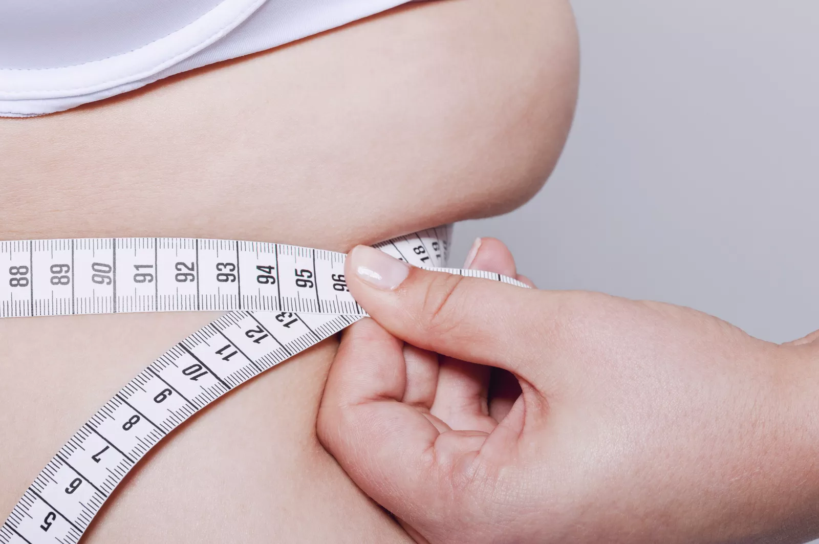 Wireless scales tracking weight loss progress in a home setting.