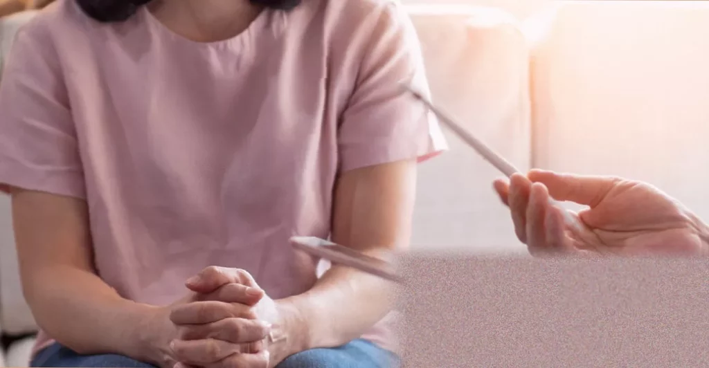 Drug extends life for women with aggressive ovarian cancer A researcher in a lab coat analysing data from a clinical trial for ovarian cancer.