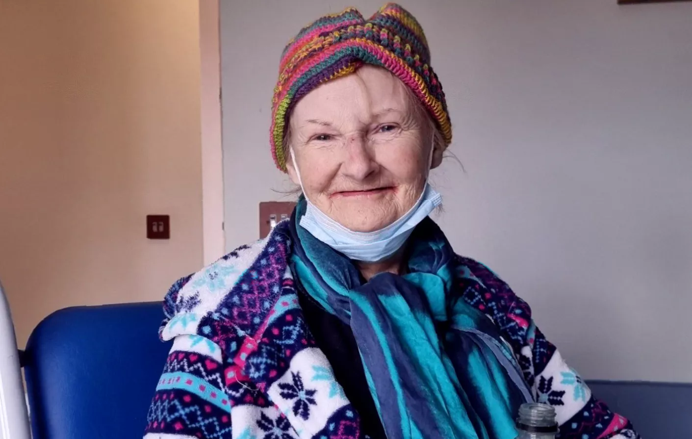 A family finding support at a bright, modern Maggie's cancer support centre.