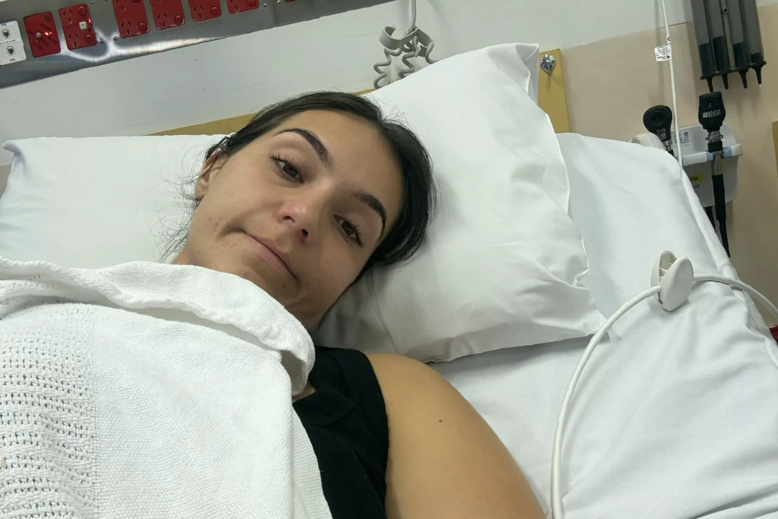 A patient receiving chemotherapy treatment in a hospital clinic.