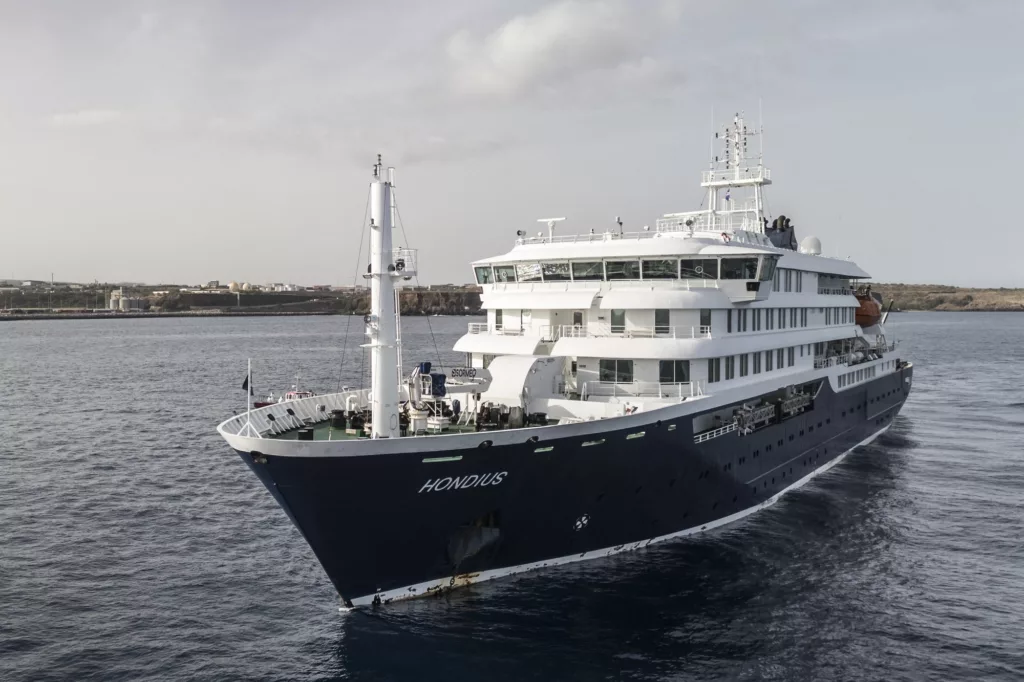 A cruise ship anchored off the coast of Tenerife as part of a hantavirus repatriation operation