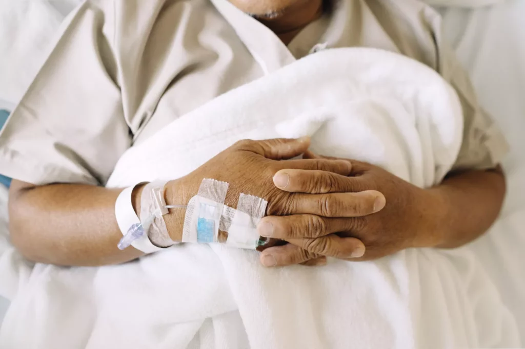 Patient viewing NHS app test results on smartphone at home