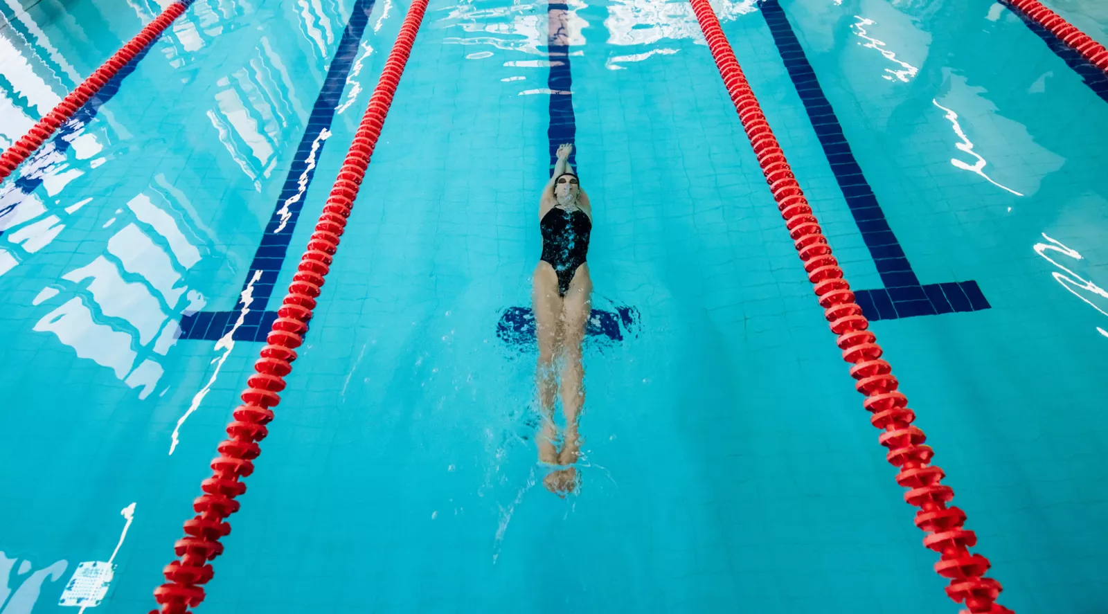 A sign in a UK leisure centre displaying lane swimming etiquette rules