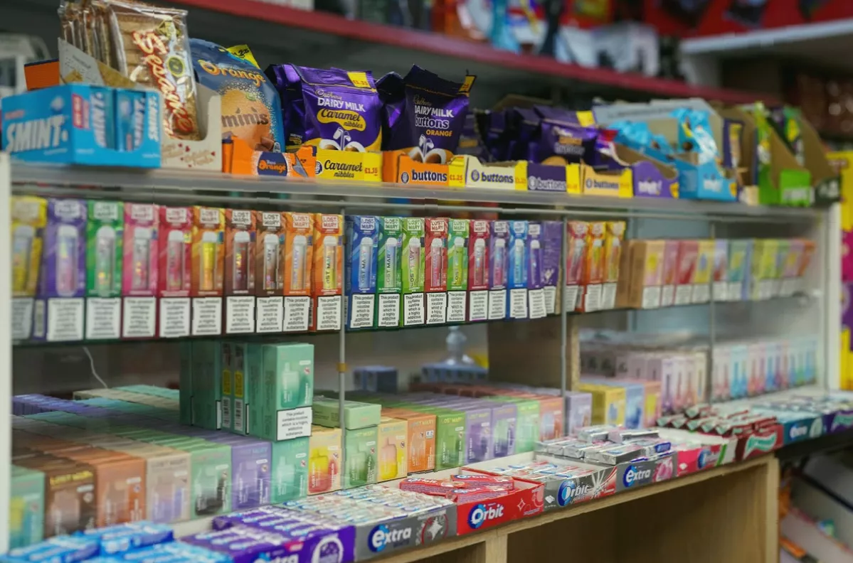 Shelves of flavoured e-cigarettes and nicotine pouches in an American shop