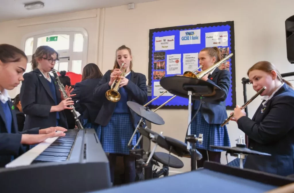 Mastering a musical instrument could fend off cognitive decline and boost attention A young musician practising with a keyboard in a bright, quiet room