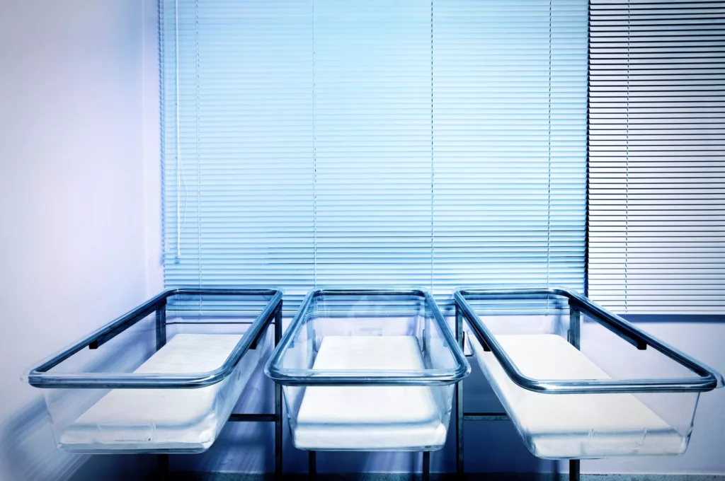 Graph showing the declining UK fertility rate from 1.41 to below replacement level