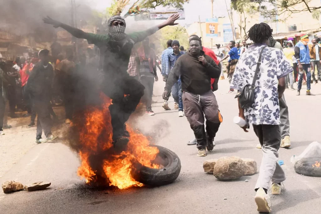 Protesters burning tyres and blocking roads near Laikipia Air Base in Nanyuki, Kenya
