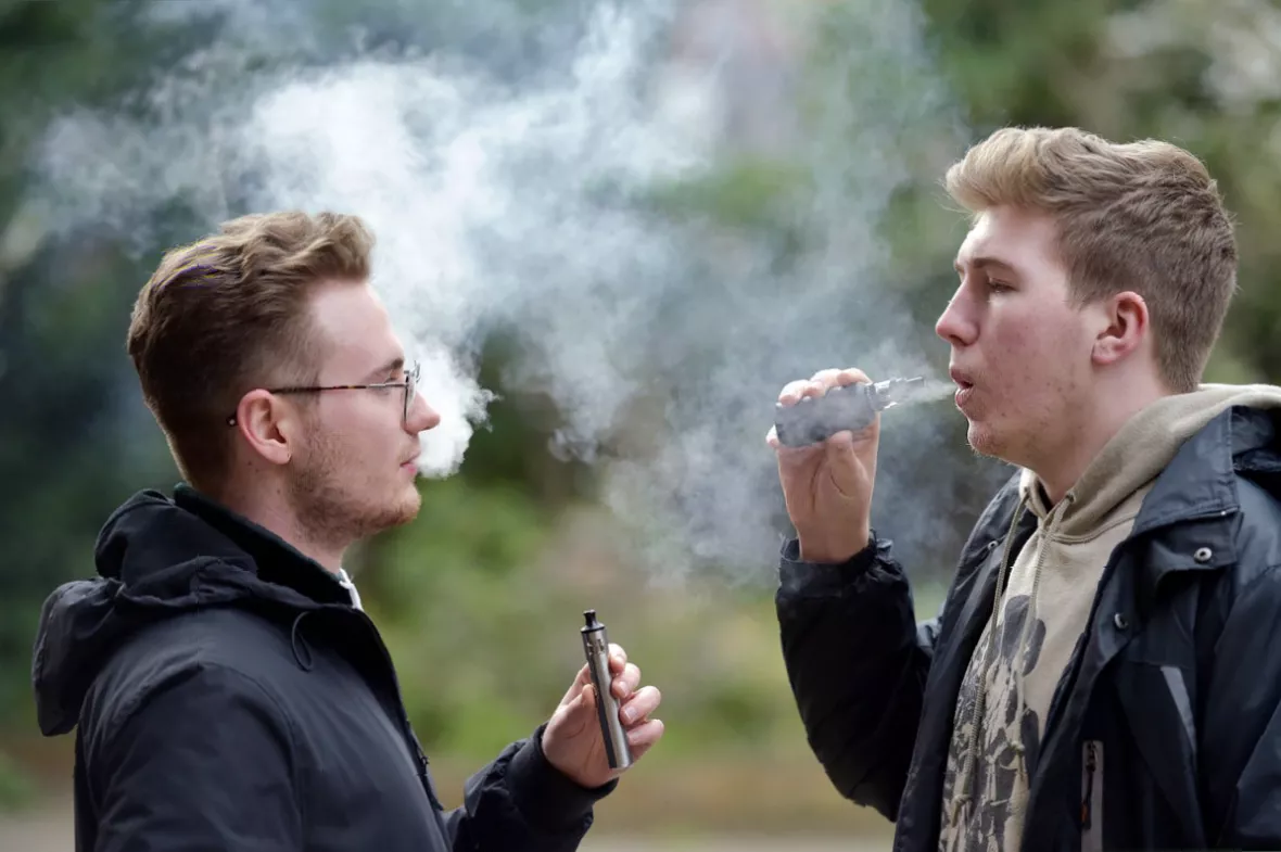 A smartphone screen displaying an age-verification app used to unlock a vaping device