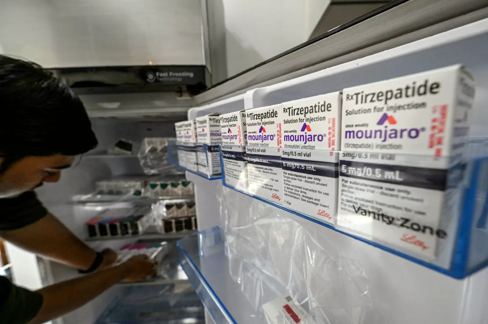 Cooling pouch and cool packs used to transport medication safely in hot weather