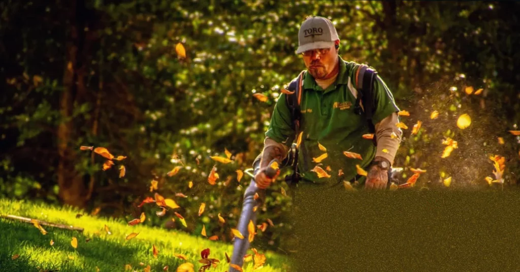 Leaf blowers branded antisocial garden tools A person using a petrol leaf blower in a residential garden, with no hearing protection visible