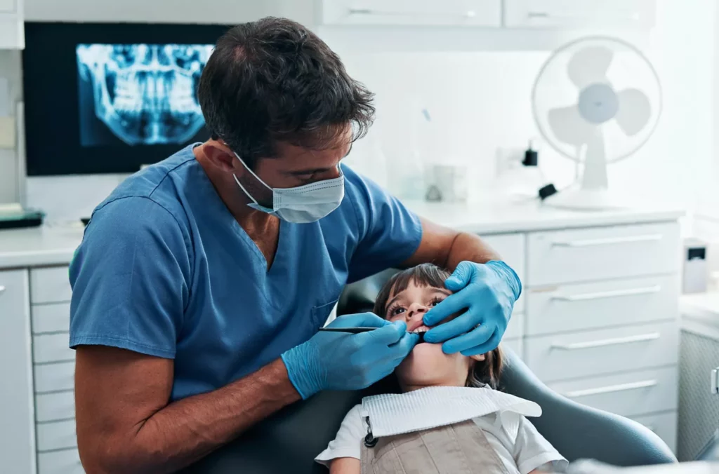 Mystery tooth condition puts millions of children at risk, experts warn Close-up of a child’s discoloured molar with chalky white and brown patches
