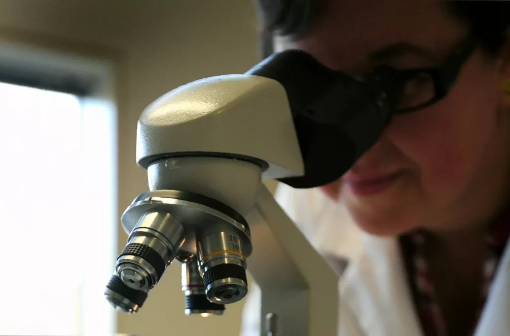New ovarian cancer treatment approved for NHS, first in decades Female patient in a hospital room receiving an intravenous infusion of the new ovarian cancer drug