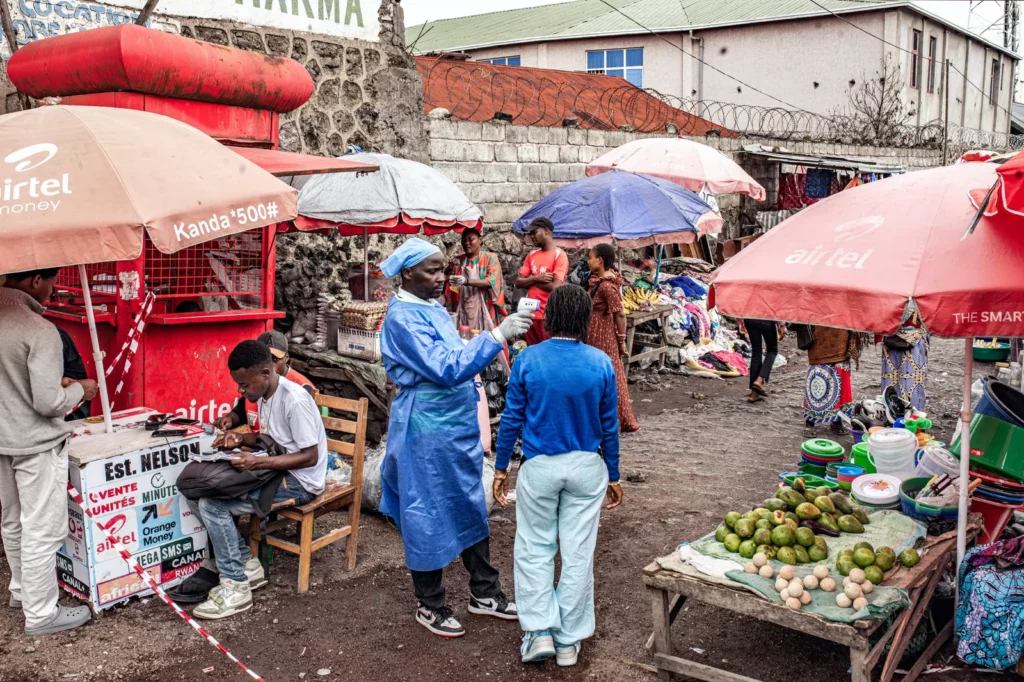 Red Cross says rapid Ebola outbreak in DRC highlights decades of development failings Aerial view of displacement camps and damaged infrastructure in eastern DRC