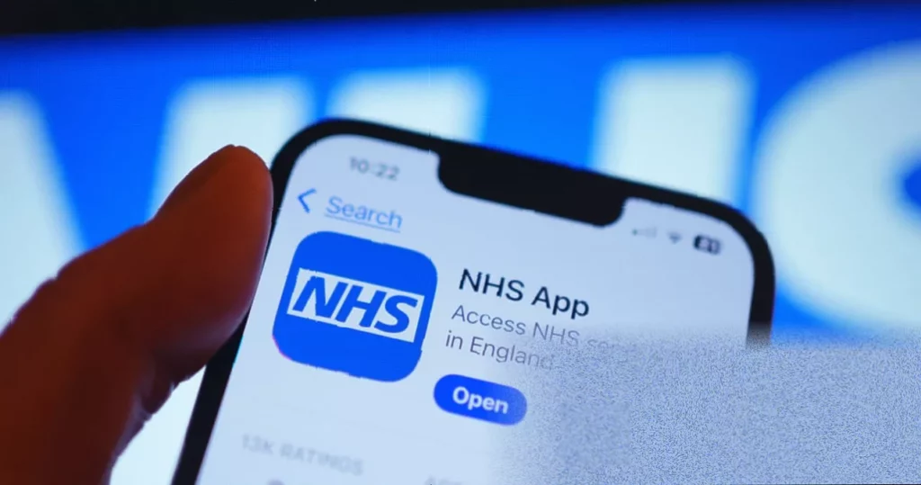 Patient using the NHS App on a smartphone to describe symptoms for AI assessment